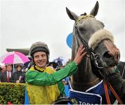 31 July 2012; Jockey Declan McDonagh celebrates in the winners enclosure after victory in the Topaz Mile European Breeders Fund Handicap on Vastonea. Galway Racing Festival 2012, Ballybrit, Galway. Picture credit: Barry Cregg / SPORTSFILE