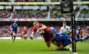 7 October 2017; Keith Earls of Munster scores his side's second try despite the tackle of Adam Byrne of Leinster during the Guinness PRO14 Round 6 match between Leinster and Munster at the Aviva Stadium in Dublin. Photo by Brendan Moran/Sportsfile