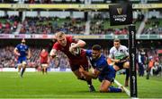 7 October 2017; Keith Earls of Munster scores his side's second try despite the tackle of Adam Byrne of Leinster during the Guinness PRO14 Round 6 match between Leinster and Munster at the Aviva Stadium in Dublin. Photo by Brendan Moran/Sportsfile
