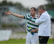 27 July 2012; Stephen Kenny, Shamrock Rovers manager, right, and Stephen Rice in conversation during the first half. Airtricity League Premier Division, Derry City v Shamrock Rovers, Brandywell, Derry. Picture credit: Oliver McVeigh / SPORTSFILE