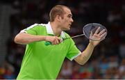 30 July 2012; Ireland's Scott Evans competes during the men's singles group play stage match with China's Lin Dan. London 2012 Olympic Games, Badminton, Wembley Arena, Wembley, London, England. Picture credit: Stephen McCarthy / SPORTSFILE