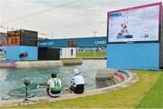 1 August 2012; Ireland's Eoin Rheinisch, left, and Richard Hounslow, Great Britain, watch the rest of their competitors after their runs in the semi-final of the Men's Kayak Single K1 where Rheinisch finished in 14th place and did not qualify for the final. London 2012 Olympic Games, Canoeing, Lee Valley White Water Centre, Waltham Cross, Hertfordshire, London, England. Picture credit: Brendan Moran / SPORTSFILE