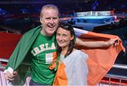 2 August 2012; Thomas Quinn, from Dublin, and Maura O'Driscoll, from Skibbereen, Co. Cork, at the ExCel Arena, ahead of Darren O'Neill's middle 75kg round of 16 contest against Stefan Hartel, Germany. London 2012 Olympic Games, Boxing, South Arena 2, ExCeL Arena, Royal Victoria Dock, London, England. Picture credit: David Maher / SPORTSFILE