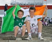 2 August 2012; Thomas Keskin, left, age 7, with his brother Henry, on his eleventh birthday today, both from Clarinbridge, Co. Galway, outside the ExCel Arena, ahead of Darren O'Neill's middle 75kg round of 16 contest against Stefan Hartel, Germany. London 2012 Olympic Games, Boxing, South Arena 2, ExCeL Arena, Royal Victoria Dock, London, England. Picture credit: David Maher / SPORTSFILE