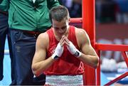 2 August 2012; A dejected  Darren O'Neill, Ireland steps out of the ring, after being defeated by Stefan Hartel, Germany, in their men's middle 75kg round of 16 contest. London 2012 Olympic Games, Boxing, South Arena 2, ExCeL Arena, Royal Victoria Dock, London, England. Picture credit: David Maher / SPORTSFILE