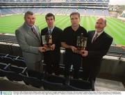 8 October 2002; Kilkenny hurler Philip Larkin, 2nd from left and Armagh captain Kieran McGeeney, who was named Vodafone Player of the Month for September in Football by Sean McCague, left, President of the GAA and Gerry Fahy, right, Strategy Director, Vodafone, at a luncheon in Croke Park, Dublin. Football. Picture credit; Brendan Moran / SPORTSFILE