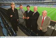 8 October 2002; Kilkenny hurler Philip Larkin, who was named Vodafone Player of the Month for September in Hurling with his parents Eileen, left, and Philip &quot;Fan&quot; and Sean McCague, 2nd left, President of the GAA and Gerry Fahy, 4th from left, Strategy Director, Vodafone, at a luncheon in Croke Park, Dublin. Football. Picture credit; Brendan Moran / SPORTSFILE