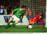 16 October 2002; With goalkeeper Jorg Steil and Bernt Haas (2), Switzerland, beaten Republic of Ireland's Robbie Keane miss his chance to score early in the first half. Republic of Ireland v Switzerland, European Championships 2004 Qualifier, Lansdowne Road, Dublin. Soccer. Picture credit; David Maher / SPORTSFILE