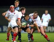 18 October 2002; Craig Morgan, Cardiff, is tackled by Ulster's Matt Sexton, left, and Robbie Kempson. Ulster v Cardiff, Heineken European Cup, Rugby, Ravenhill, Belfast. Picture credit; Damien Eagers / SPORTSFILE *EDI*