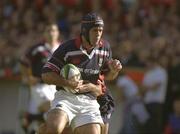 12 October 2002; Mike Mullins, Munster, is tackled by Terry Fanolua, Gloucester. Heineken European Cup, Gloucester v Munster, Kingsholm Stadium, Gloucester, England. Rugby. Picture credit; Brendan Moran / SPORTSFILE *EDI*