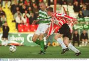 27 October 2002; Tony Grant, Shamrock Rovers, in action against Derry City's Eamon Doherty. Shamrock Rovers v Derry City, FAI Carlsberg Cup Final, Tolka Park, Dublin. Soccer. Picture credit; Pat Murphy / SPORTSFILE