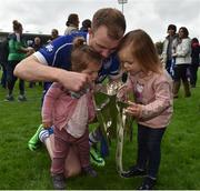 8 October 2017; Lar Corbett of Thurles Sarsfields looks in the Dan Breen Cup, with his daughters Quinn age 1, and Faye age 3, after the Tipperary County Senior Hurling Championship Final match between Thurles Sarsfields and Borris-Ileigh at Semple Stadium in Thurles, Co Tipperary. Photo by Matt Browne/Sportsfile