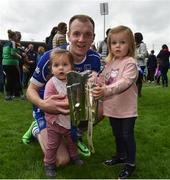 8 October 2017; Lar Corbett of Thurles Sarsfields lifts the Dan Breen Cup, with his daughters Quinn age 1, and Faye age 3, after the Tipperary County Senior Hurling Championship Final match between Thurles Sarsfields and Borris-Ileigh at Semple Stadium in Thurles, Co Tipperary. Photo by Matt Browne/Sportsfile
