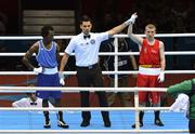 4 August 2012; Paddy Barnes, Ireland, is declared the winner over Thomas Essomba, Cameroon, in their men's light fly 49kg round of 16 contest. London 2012 Olympic Games, Boxing, South Arena 2, ExCeL Arena, Royal Victoria Dock, London, England. Picture credit: David Maher / SPORTSFILE