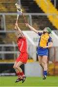 4 August 2012; Pamela Mackey, Cork, in action against Fiona Lafferty, Clare. All-Ireland Senior Camogie Championship Quarter-Final, Cork v Clare, Páirc Ui Chaoimh, Cork. Picture credit: Pat Murphy / SPORTSFILE