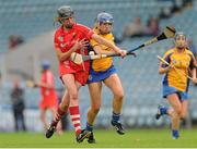 4 August 2012; Orla Cotter, Cork, in action against Kate Lynch, Clare. All-Ireland Senior Camogie Championship Quarter-Final, Cork v Clare, Páirc Ui Chaoimh, Cork. Picture credit: Pat Murphy / SPORTSFILE