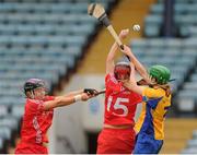 4 August 2012; Anna Geary and Sile Burns, 15, Cork, in action against Marian O'Brien, Clare. All-Ireland Senior Camogie Championship Quarter-Final, Cork v Clare, Páirc Ui Chaoimh, Cork. Picture credit: Pat Murphy / SPORTSFILE