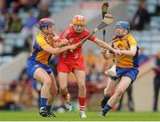 4 August 2012; Katie Buckley, Cork, in action against Cloe Morey, left, and Marie McGrath, Clare. All-Ireland Senior Camogie Championship Quarter-Final, Cork v Clare, Páirc Ui Chaoimh, Cork. Picture credit: Pat Murphy / SPORTSFILE