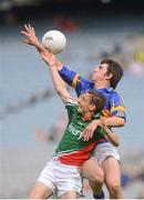 4 August 2012; Colin O'Riordan, Tipperary, in action against James Quinn, Mayo. Electric Ireland GAA Football All-Ireland Minor Championship Quarter-Final, Mayo v Tipperary, Croke Park, Dublin. Picture credit: Brian Lawlesss / SPORTSFILE