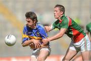 4 August 2012; Colin O'Riordan, Tipperary, in action against Stephen Coen, Mayo. Electric Ireland GAA Football All-Ireland Minor Championship Quarter-Final, Mayo v Tipperary, Croke Park, Dublin. Picture credit: Brian Lawlesss / SPORTSFILE