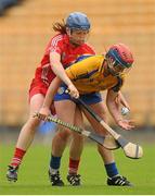 4 August 2012; Cloe Morey, Clare, in action against Joanne Casey, Cork. All-Ireland Senior Camogie Championship Quarter-Final, Cork v Clare, Páirc Ui Chaoimh, Cork. Picture credit: Pat Murphy / SPORTSFILE