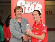 4 August 2012; Jennifer O'Leary, Cork, is presented with the player of the match award by Marie Kearney, Ard Comhairle member of the Camogie Association. All-Ireland Senior Camogie Championship Quarter-Final, Cork v Clare, Páirc Ui Chaoimh, Cork. Picture credit: Pat Murphy / SPORTSFILE