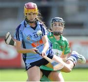 4 August 2012; Aisling Carolan, Dublin, in action against Marion Crea, Offaly. All-Ireland Senior Camogie Championship Quarter-Final, Dublin v Offaly, Parnell Park, Dublin. Picture credit: Ray Lohan / SPORTSFILE