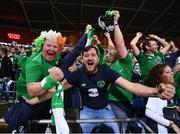 9 October 2017; Republic of Ireland supporters celebrate following the FIFA World Cup Qualifier Group D match between Wales and Republic of Ireland at Cardiff City Stadium in Cardiff, Wales. Photo by Stephen McCarthy/Sportsfile