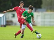 10 October 2017; Aaron Bolger of Republic of Ireland in action against Dejan Joveljic of Serbia during the UEFA European U19 Championship Qualifier match between Republic of Ireland and Serbia at RSC in Waterford. Photo by Matt Browne/Sportsfile