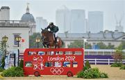 5 August 2012; Ireland's Cian O'Connor, on Blue Loyd 12, clears fence number 3 during the second qualifier of the individual show jumping where he finished the round with 8 faults. London 2012 Olympic Games, Equestrian, Greenwich Park, Greenwich, London, England. Picture credit: Brendan Moran / SPORTSFILE