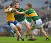 5 August 2012; Ultan Harney, Roscommon, in action against Greg Horan, centre, and Gavin Crowley, right, Kerry. Electric Ireland GAA Football All-Ireland Minor Championship Quarter-Final, Roscommon v Kerry, Croke Park, Dublin. Picture credit: Barry Cregg / SPORTSFILE