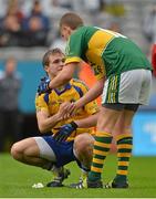 5 August 2012; A dejected Ultan Harney, Roscommon, is consoled by Cillian Fitzgerald, Kerry, after the game. Electric Ireland GAA Football All-Ireland Minor Championship Quarter-Final, Roscommon v Kerry, Croke Park, Dublin. Picture credit: Barry Cregg / SPORTSFILE