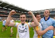 5 August 2012; Donegal's Leo McLoone, 11, Paddy McGrath and Neil McGee, right, celebrate after the final whistle. GAA Football All-Ireland Senior Championship Quarter-Final, Donegal v Kerry, Croke Park, Dublin. Picture credit: Ray McManus / SPORTSFILE