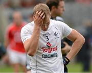 5 August 2012; A dejected Peter Kelly, Kildare, leaves the pitch after the game. GAA Football All-Ireland Senior Championship Quarter-Final, Cork v Kildare, Croke Park, Dublin. Picture credit: Dáire Brennan / SPORTSFILE