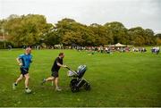 14 October 2017; Runners finish the Malahide parkrun where Vhi ambassador and Olympian David Gillick also took part as Vhi hosted a special event to celebrate their partnership with parkrun Ireland. David was on hand to lead the warm up for parkrun participants before completing the 5km course alongside newcomers and seasoned parkrunners alike. Vhi provided walkers, joggers, runners and volunteers at Malahide parkrun with a variety of refreshments in the Vhi Relaxation Area at the finish line. A qualified physiotherapist was also available to guide participants through a post event stretching routine to ease those aching muscles.  parkruns take place over a 5km course weekly, are free to enter and are open to all ages and abilities, providing a fun and safe environment to enjoy exercise. To register for a parkrun near you visit www.parkrun.ie. New registrants should select their chosen event as their home location. You will then receive a personal barcode which acts as your free entry to any parkrun event worldwide. Photo by Cody Glenn/Sportsfile