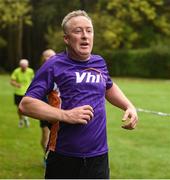 14 October 2017; Declan Moran, Director of Marketing & Business Development Vhi, finishes the Malahide parkrun where Vhi ambassador and Olympian David Gillick also took part as Vhi hosted a special event to celebrate their partnership with parkrun Ireland. David was on hand to lead the warm up for parkrun participants before completing the 5km course alongside newcomers and seasoned parkrunners alike. Vhi provided walkers, joggers, runners and volunteers at Malahide parkrun with a variety of refreshments in the Vhi Relaxation Area at the finish line. A qualified physiotherapist was also available to guide participants through a post event stretching routine to ease those aching muscles.  parkruns take place over a 5km course weekly, are free to enter and are open to all ages and abilities, providing a fun and safe environment to enjoy exercise. To register for a parkrun near you visit www.parkrun.ie. New registrants should select their chosen event as their home location. You will then receive a personal barcode which acts as your free entry to any parkrun event worldwide. Photo by Cody Glenn/Sportsfile