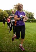 14 October 2017; Vhi's Anne Best finishes the Malahide parkrun where Vhi ambassador and Olympian David Gillick also took part as Vhi hosted a special event to celebrate their partnership with parkrun Ireland. David was on hand to lead the warm up for parkrun participants before completing the 5km course alongside newcomers and seasoned parkrunners alike. Vhi provided walkers, joggers, runners and volunteers at Malahide parkrun with a variety of refreshments in the Vhi Relaxation Area at the finish line. A qualified physiotherapist was also available to guide participants through a post event stretching routine to ease those aching muscles. parkruns take place over a 5km course weekly, are free to enter and are open to all ages and abilities, providing a fun and safe environment to enjoy exercise. To register for a parkrun near you visit www.parkrun.ie. New registrants should select their chosen event as their home location. You will then receive a personal barcode which acts as your free entry to any parkrun event worldwide. Photo by Cody Glenn/Sportsfile