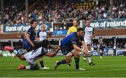 14 October 2017; Robbie Henshaw of Leinster scores his side's third try despite the tackle of Joseph Tomane of Montpellier during the European Rugby Champions Cup Pool 3 Round 1 match between Leinster and Montpellier at the RDS Arena in Dublin. Photo by Ramsey Cardy/Sportsfile