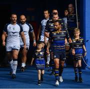 14 October 2017; Matchday mascots 7 year old Jayden Moore-Connors, from Clondalkin, Dublin, and 10 year old Nicholas Holmes, from Dublin, with captain Isa Nacewa ahead of the European Rugby Champions Cup Pool 3 Round 1 match between Leinster and Montpellier at the RDS Arena in Dublin.   Photo by Ramsey Cardy/Sportsfile