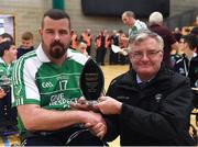 14 October 2017; Leinster captain Lorcan Madden is presented with the Player of the Tournament award by Gerry O'Connor, Chairman of the Hurling Committee Sligo, following the M. Donnelly GAA Wheelchair Hurling All-Ireland Finals at Knocknarea Arena, I.T Sligo in Sligo. Photo by Seb Daly/Sportsfile