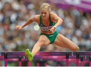 6 August 2012; Ireland's Derval O'Rourke competes in her heat of the women's 100m hurdles, where she finished 4th in a time of 12.91 and qualified for the semi-finals. London 2012 Olympic Games, Athletics, Olympic Stadium, Olympic Park, Stratford, London, England. Picture credit: Brendan Moran / SPORTSFILE