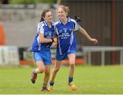 6 August 2012; Laura Egan, Clare, right, celebrates with team-mate Shaunagh O'Brien after scoring her side's third goal. Both teams wore provincial colours due to a colour clash, Clare, blue, and Roscommon, white. All-Ireland Ladies Football Minor B Championship Final, Clare v Roscommon, St. Brendan’s Park, Birr, Co. Offaly. Picture credit: Pat Murphy / SPORTSFILE