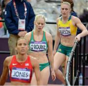 7 August 2012; Ireland's Derval O’Rourke leaves the track behind Lolo Jones, USA, and ahead of Sally Pearson, Australia, after her semi-final of the women's 100m hurdles where she finished 5th but did not qualify for the final. London 2012 Olympic Games, Athletics, Olympic Stadium, Olympic Park, Stratford, London, England. Picture credit: Brendan Moran / SPORTSFILE
