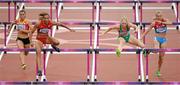 7 August 2012; Ireland's Derval O’Rourke competes with, from left, Eline Berings, Belgium, Lolo Jones, USA, and Yuliya Kondakova, Russia, in their semi-final of the women's 100m hurdles where O'Rourke finished 5th but did not qualify for the final. London 2012 Olympic Games, Athletics, Olympic Stadium, Olympic Park, Stratford, London, England. Picture credit: Brendan Moran / SPORTSFILE