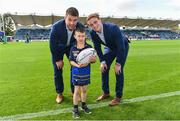 14 October 2017; Matchday mascot 7 year old Jayden Moore-Connors, from Clondalkin, Dublin, with Leinster's Sean O'Brien, left, and Cathal Marsh ahead of the European Rugby Champions Cup Pool 3 Round 1 match between Leinster and Montpellier at the RDS Arena in Dublin. Photo by Ramsey Cardy/Sportsfile