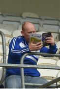 15 October 2017; Dermot Lynch having a look at the match program during the Monaghan County Senior Football Championship Final match between Magheracloone and Scotstown at St Tiernach's Park in Monaghan. Photo by Philip Fitzpatrick/Sportsfile