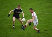 15 October 2017; Patsy Bradley of Slaughtneil in action against Paul Devlin of Kilcoo during the AIB Ulster GAA Football Senior Club Championship First Round match between Kilcoo and Slaughtneil at Páirc Esler in Down. Photo by Seb Daly/Sportsfile