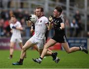 15 October 2017; Padraig Cassidy of Slaughtneil in action against Ceilum Doherty of Kilcoo during the AIB Ulster GAA Football Senior Club Championship First Round match between Kilcoo and Slaughtneil at Páirc Esler in Down. Photo by Seb Daly/Sportsfile