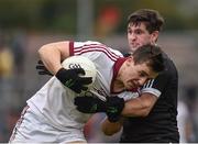 15 October 2017; Shane McGuigan of Slaughtneil in action against Darryl Branagan of Kilcoo during the AIB Ulster GAA Football Senior Club Championship First Round match between Kilcoo and Slaughtneil at Páirc Esler in Down. Photo by Seb Daly/Sportsfile