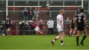 15 October 2017; Antoin McMullan of Slaughtneil saves a penalty from Darragh O’Hanlon of Kilcoo during the AIB Ulster GAA Football Senior Club Championship First Round match between Kilcoo and Slaughtneil at Páirc Esler in Down. Photo by Seb Daly/Sportsfile